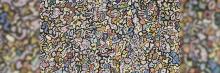 Una imagen abstracta y colorida que se asemeja a un patrón intrincado y laberíntico, lleno de formas y colores variados que invitan a la exploración visual